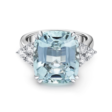 Emerald Cut Aqua with Diamond Side Stones on a 18ct White Gold Band