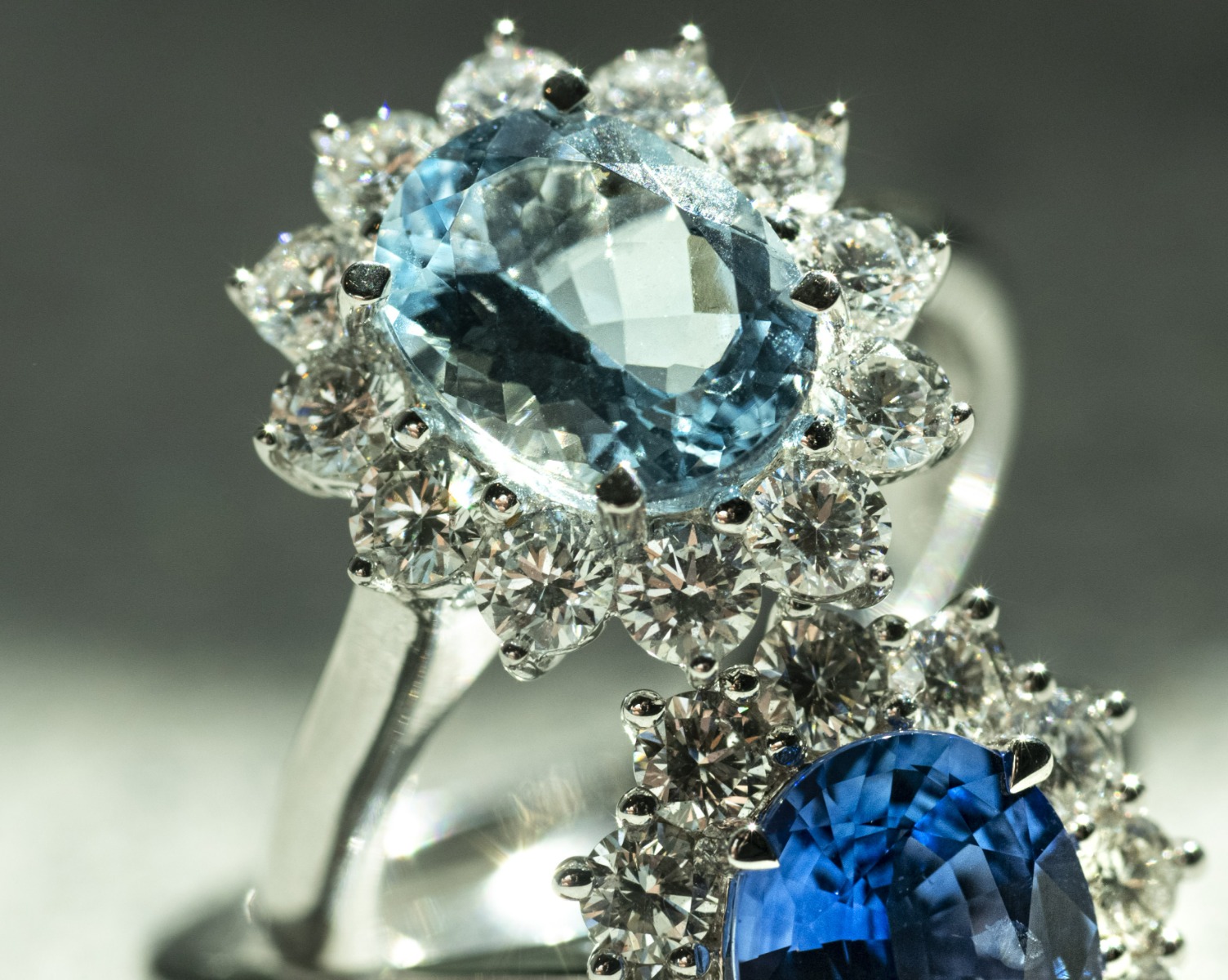 Aquamarine ring with a diamond cluster